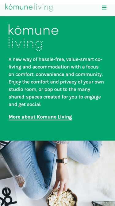 Simple and clean website design for Komune Living on mobile view.